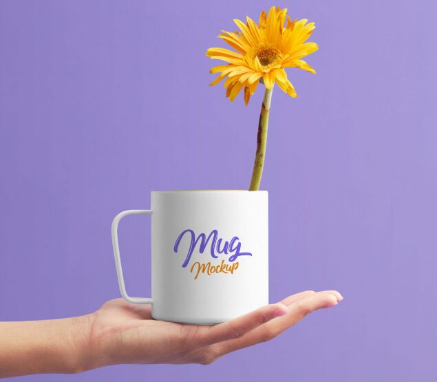 Free Mug on Female Hand Mockup PSD