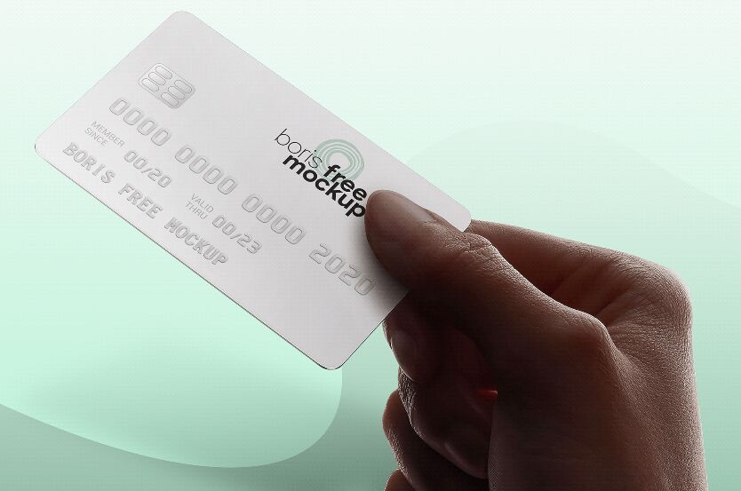 Hand Holding Credit Card Mockup PSD Freebie